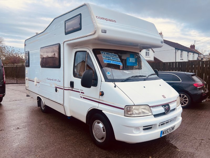 Used 2003 Compass Avantgarde 4 seat belts. Solar panel. Full service